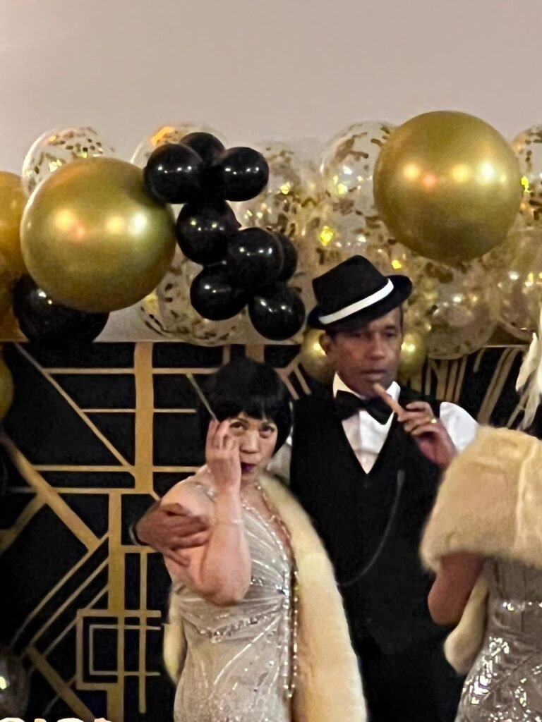 MC hosting a Gatsby theme party